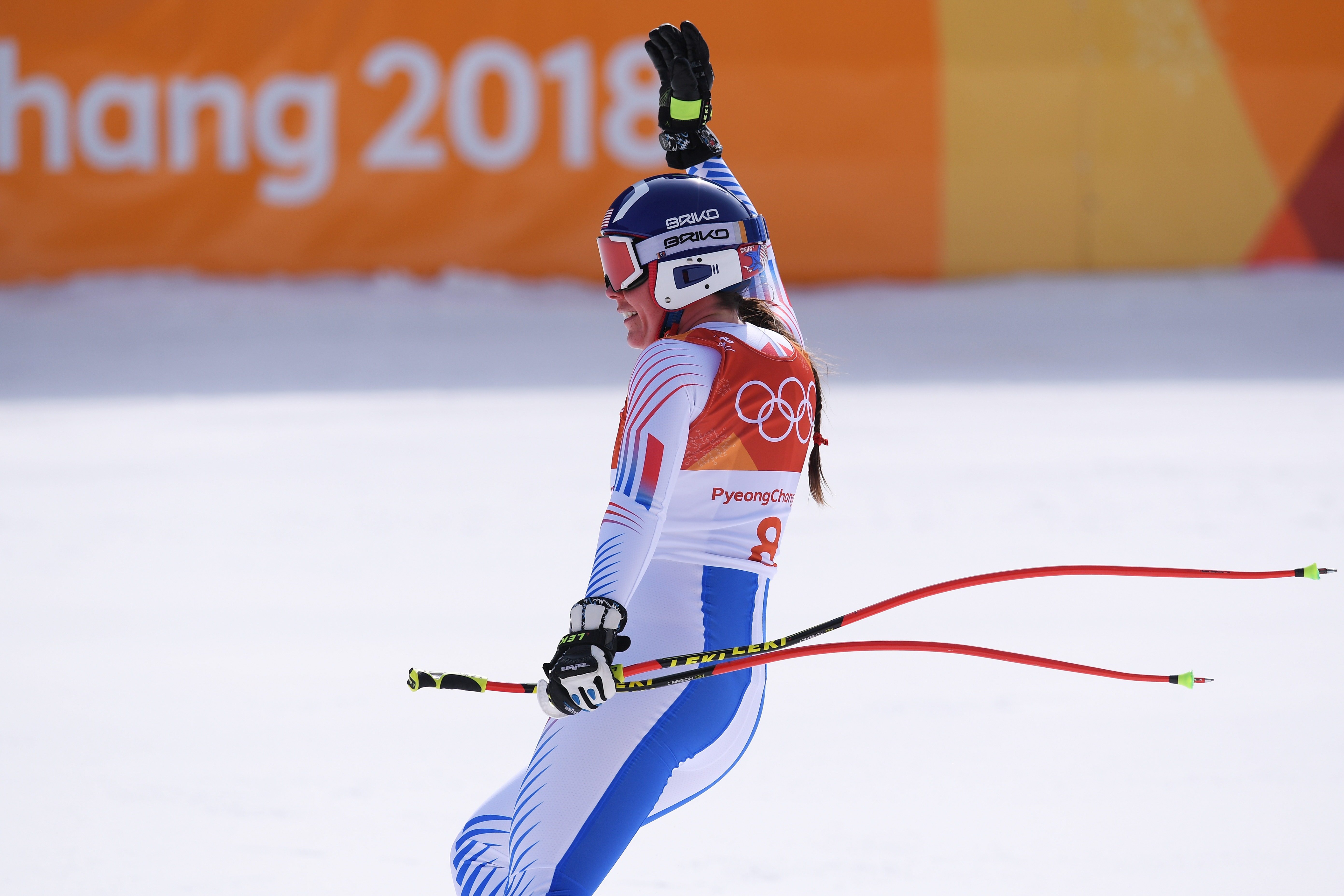 Breezy Johnson waves to the crowd in the PyeongChang downhill finish area. 