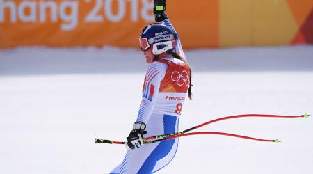 Breezy Johnson waves to the crowd in the PyeongChang downhill finish area. 