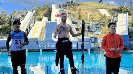 U.S. athlete Chris Lillis stands atop the podium in Park City, Utah